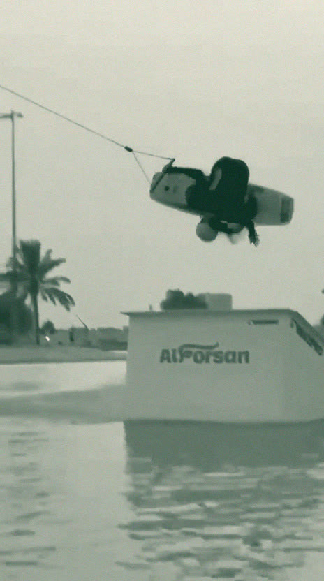 Me upside down above the Al Forsan kicker, with hand-drawn marks for rotation, pop height and torso lean